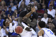 <p>RJ Barrett #5 of the Duke Blue Devils and Tacko Fall #24 of the UCF Knights compete for the ball in the second round of the 2019 NCAA Men’s Basketball Tournament held at Colonial Life Arena on March 24, 2019 in Columbia, South Carolina. (Photo by Grant Halverson/NCAA Photos via Getty Images) </p>