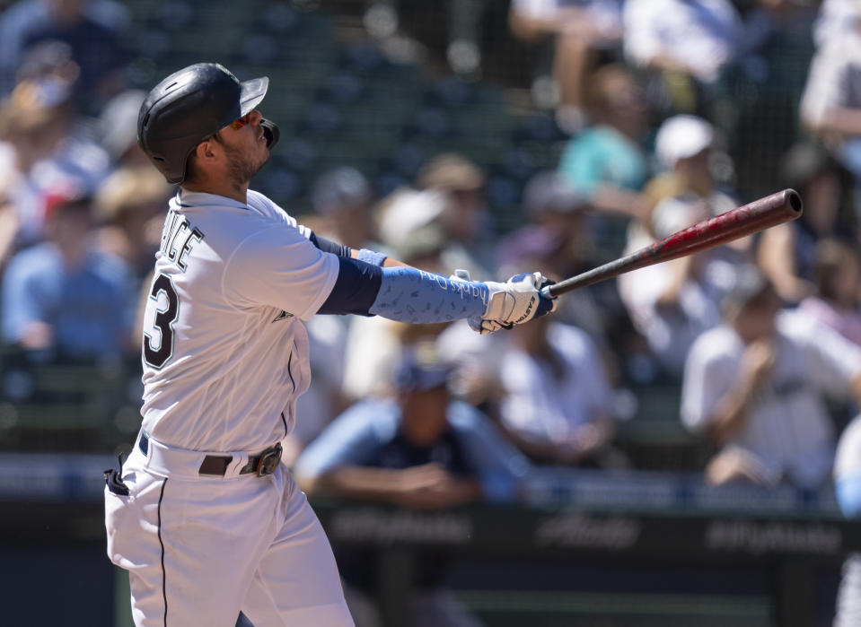 Seattle Mariners' Ty France hits a solo home run off of Tampa Bay Rays relief pitcher Ryan Thompson during the seventh inning of a baseball game, Sunday, June 20, 2021, in Seattle. (AP Photo/Stephen Brashear)