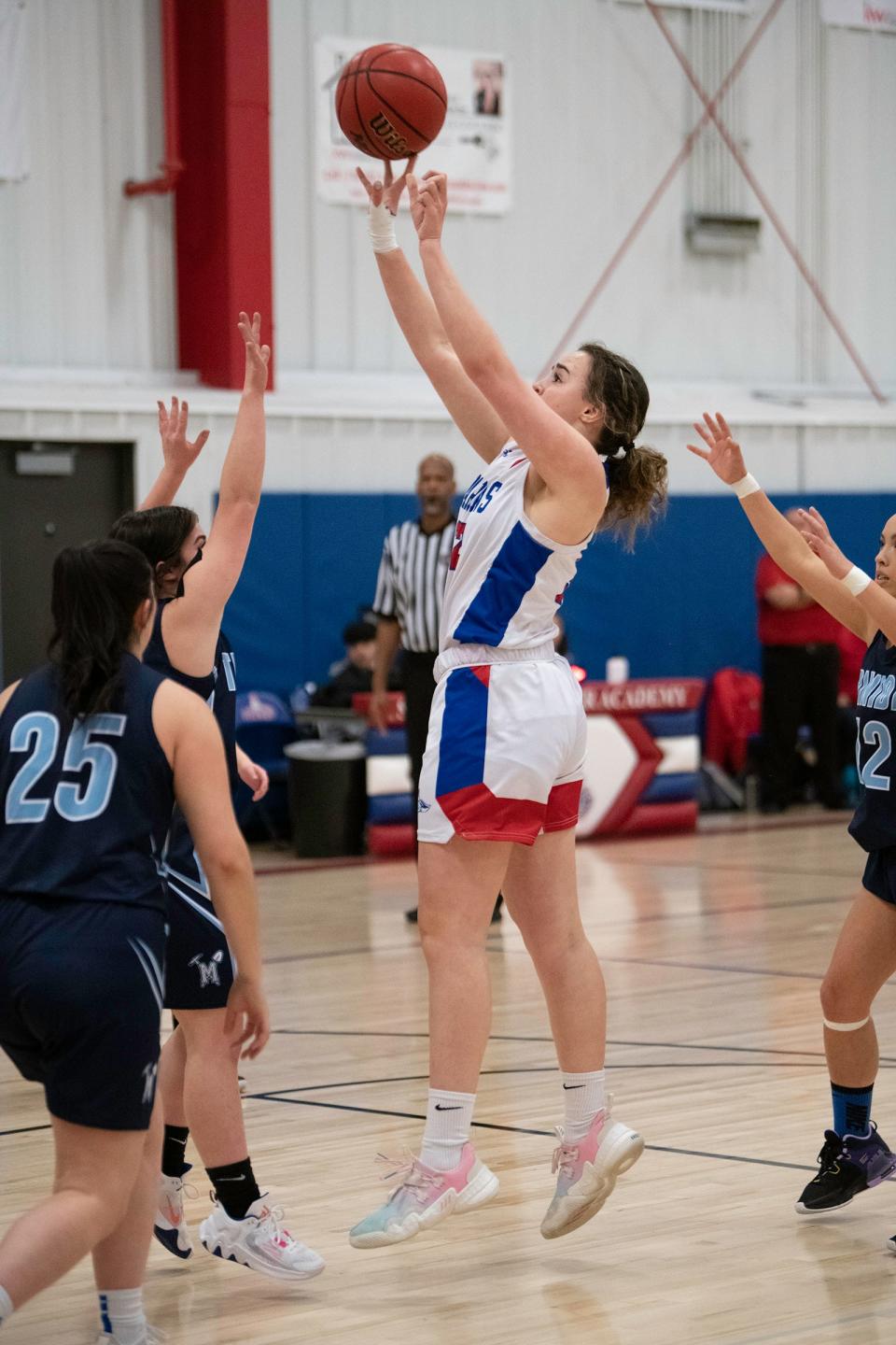 Swallows Charter Academy's Faith DeRudder shoots for two during a game against Trinidad on Friday, Dec. 16, 2022.