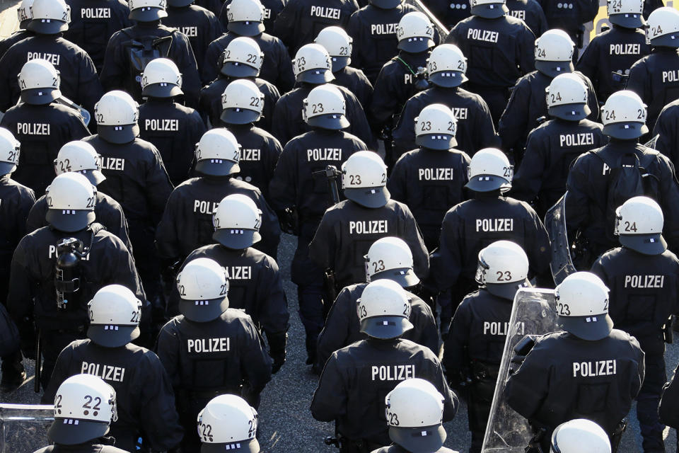 <p>German riot police stand in front of protestors during the demonstrations during the G-20 summit in Hamburg, Germany, July 6, 2017. (Photo: Fabrizio Bensch/Reuters) </p>