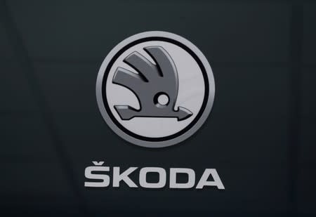 FILE PHOTO: The logo of Skoda carmaker is seen at the entrance of a showroom in Nice