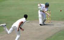 Cricket - South Africa vs Australia - Second Test - St George's Park, Port Elizabeth, South Africa - March 10, 2018. Australia's Mitchell Starc looks on as South AfricaÕs Dean Elgar plays a shot. REUTERS/Mike Hutchings