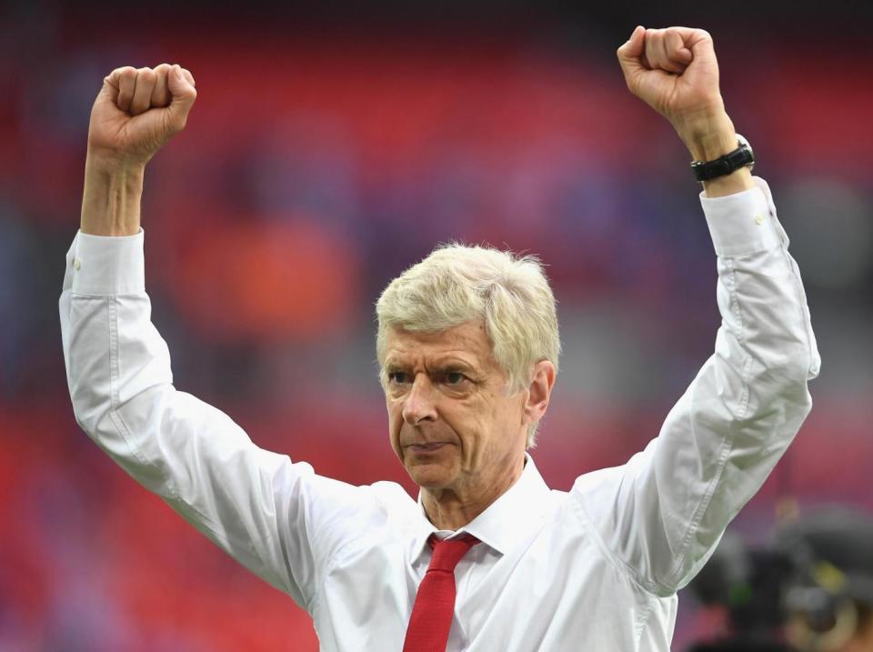 Wenger celebrates at the end of the match (Getty)