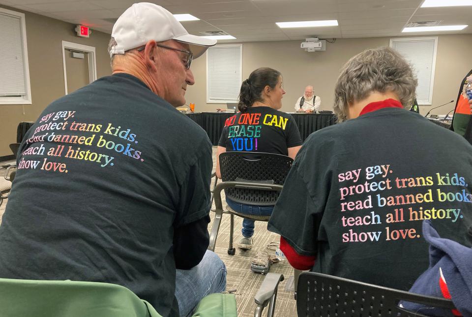 Michael and Linda Wagner of Galena wear shirts supporting the LGBTQIA + community as the Big Walnut Local School District school board discussed a resolution on Nov. 16, 2023, that would prohibit gay pride flags.