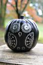 <p>This sugar-skull inspired owl pumpkin is too cute! Use a thin permanent marker to make every detail appear. </p><p>Get the tutorial at <a href="http://www.lilblueboo.com/2014/10/how-to-make-sharpie-owl-pumpkins.html?crlt.pid=camp.O1FgF2QEqIkr" rel="nofollow noopener" target="_blank" data-ylk="slk:Lil Blue Boo;elm:context_link;itc:0;sec:content-canvas" class="link ">Lil Blue Boo</a>.</p>