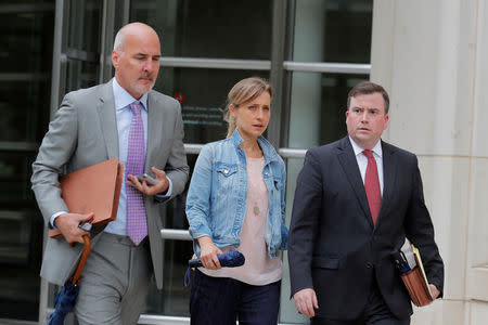 Actor Allison Mack, known for her role in the TV series 'Smallville', exits following a hearing on charges in relation to the Albany-based organization Nxivm at the United States Federal Courthouse in Brooklyn at New York, U.S., July 25, 2018. REUTERS/Brendan McDermid