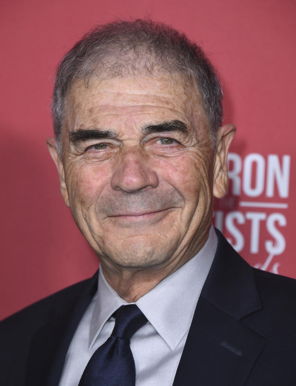 FILE - In this Nov. 8, 2018, file photo, Robert Forster arrives at the Patron of the Artists Awards at the Wallis Annenberg Center for the Performing Arts in Beverly Hills, Calif. Forster, the handsome character actor who got a career resurgence and Oscar-nomination for playing bail bondsman Max Cherry in "Jackie Brown," has died at age 78. Forster's agent Julia Buchwald says he died Friday, Oct. 11, 2019, at home in Los Angeles of brain cancer. (Photo by Jordan Strauss/Invision/AP, File)