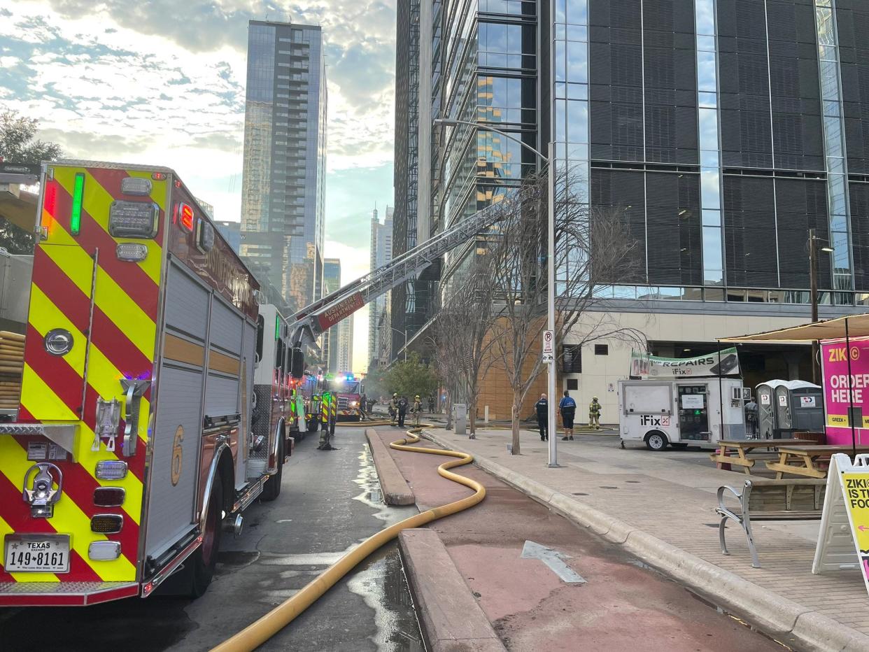 Crew from the Austin Fire Department respond to a fire at Red Ash in downtown Austin on Monday evening.