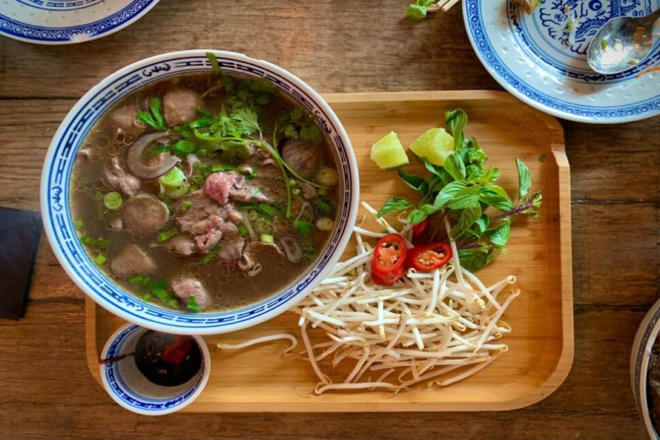 Bowl with Soup on a Wooden Tray
