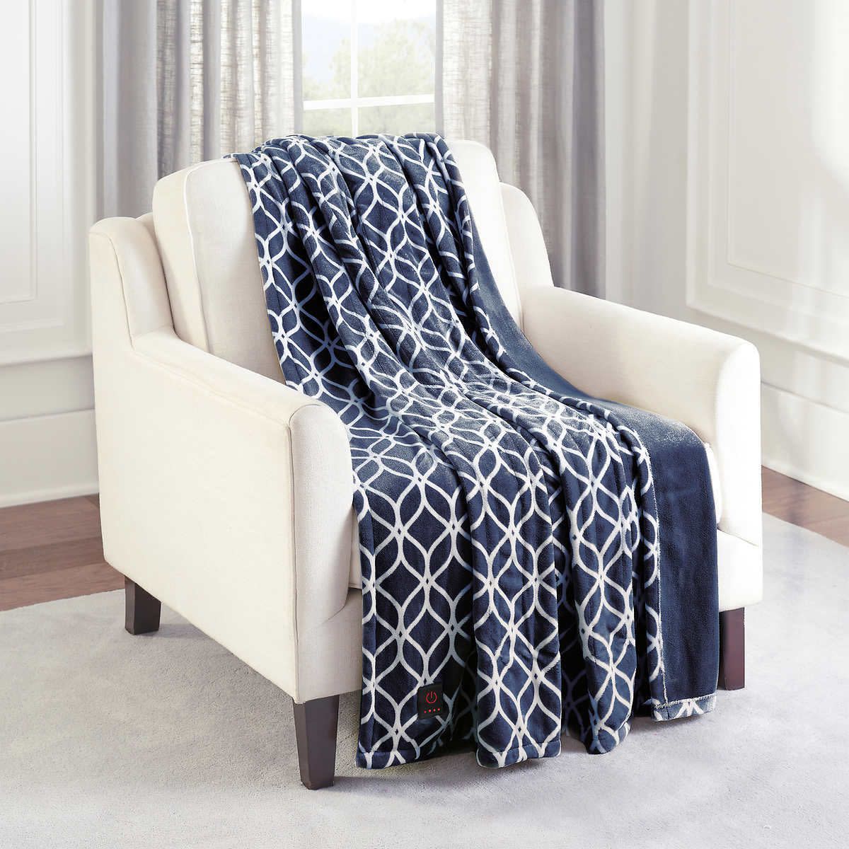 Brookstone Heated Throw Blanket on chair