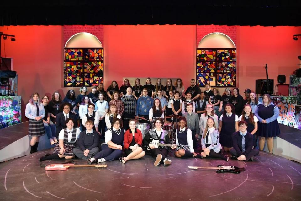 The Ambridge High School cast of "School of Rock: The Musical."