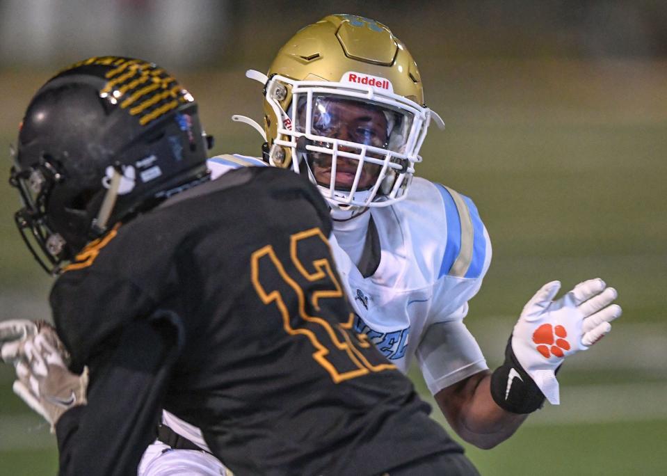 DW Daniel senior Misun Kelley (2) covers Crescent sophomore Tron Paul (12) during the second quarter at Crescent High in Iva, S.C. Friday, October 28, 2022.