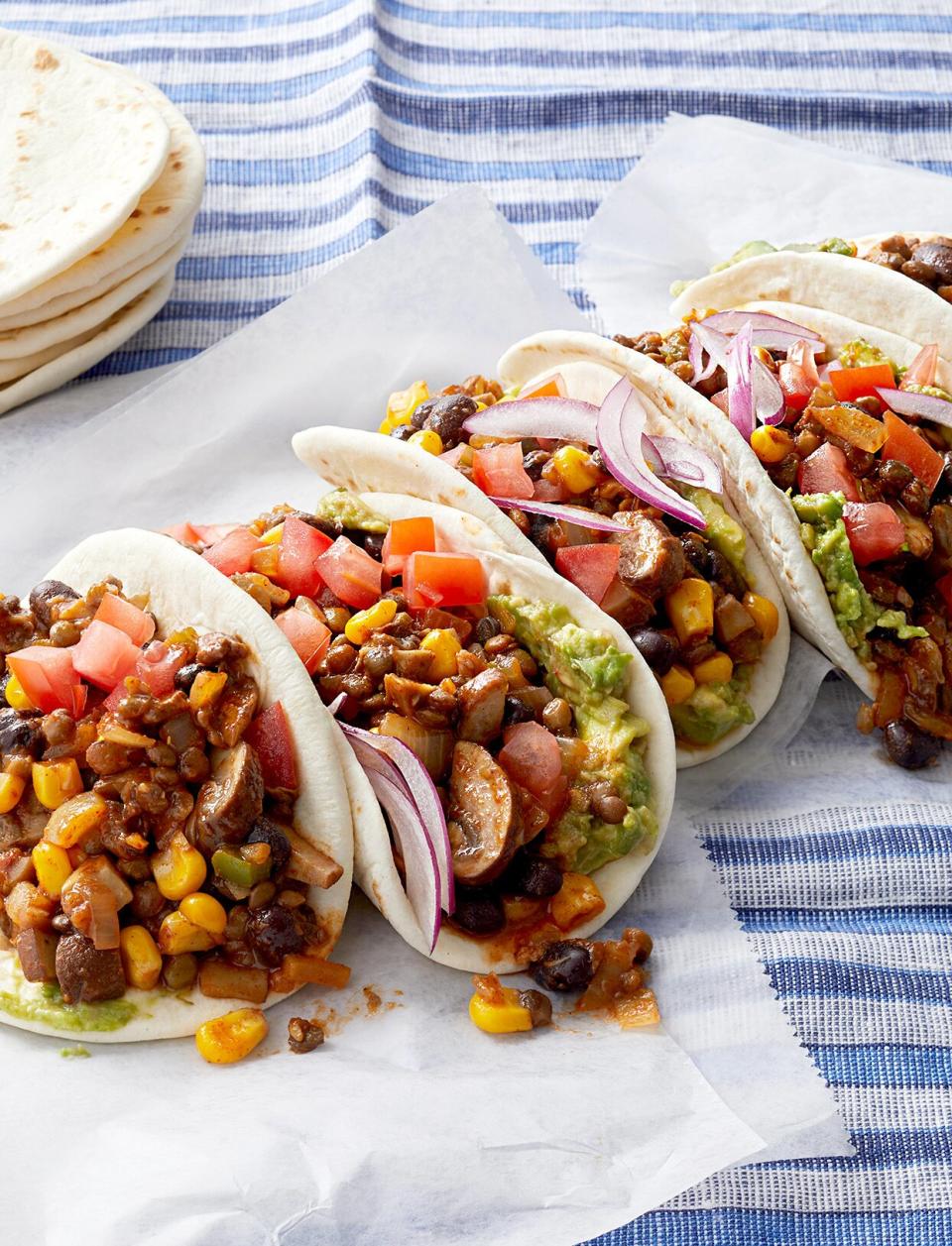 Enjoy a meatless dinner tonight with these filling lentil and black bean tacos. Use already-steamed lentils and this is one-pot meal will be on the table in no time.