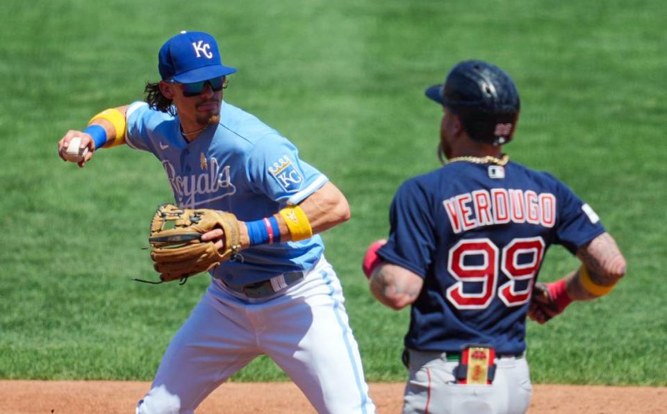 Royals shortstop Bobby Witt Jr. throws to first base as Boston Red Sox right fielder Alex Verdugo runs toward second on Sunday afternoon at Kauffman Stadium.