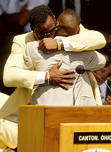 Jared Payton hugs his father Walter Payton at the 1993 Hall of Fame induction ceremony at the Pro Football Hall of Fame