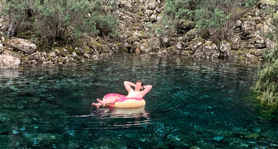 A man swimming in Disappearing Tarn at Mount Wellington on Instagram. 