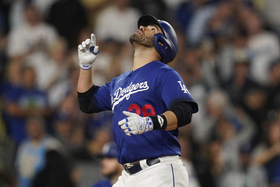 Los Angeles Dodgers designated hitter J.D. Martinez celebrates after hitting a three-run home run during the third inning of a baseball game against the Detroit Tigers, Monday, Sept. 18, 2023, in Los Angeles. Mookie Betts and Freddie Freeman also scored. (AP Photo/Ryan Sun)