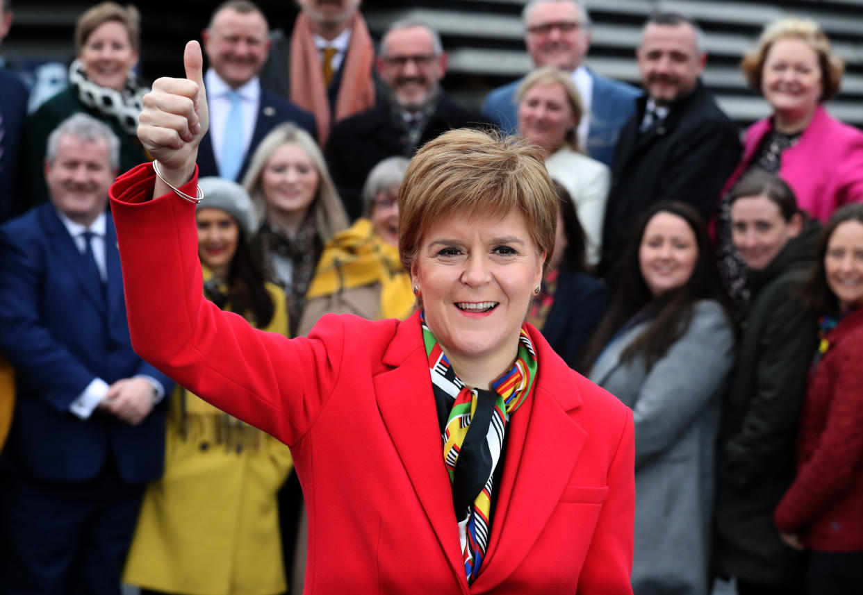 First Minister Nicola Sturgeon joins SNP's newly elected MPs for a group photo call outside the V&A Museum in Dundee. (Photo by Andrew Milligan/PA Images via Getty Images)