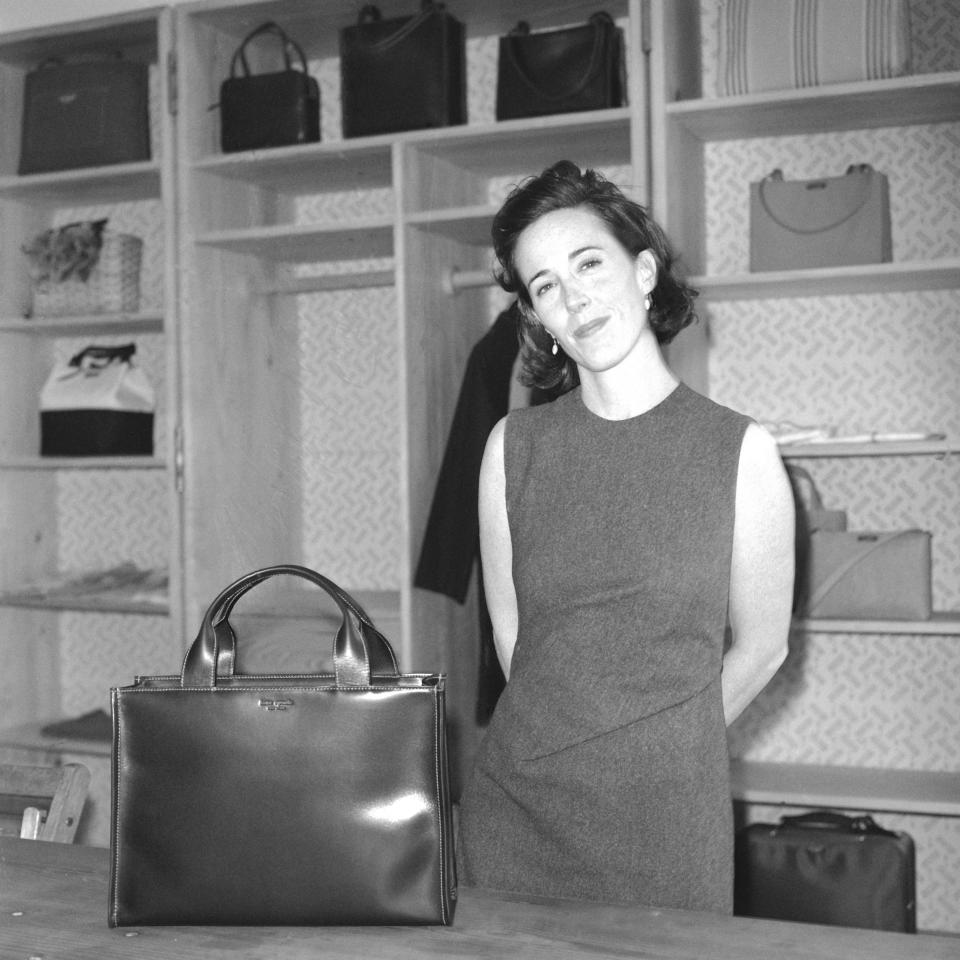 Kate Spade with a handbag of her own design in 1998 in New York. (Photo: Thomas Iannaccone/Penske Media/Rex/Shutterstock)