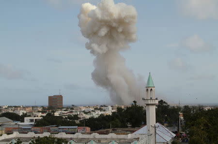 A general view shows smoke from the Jazeera hotel during an attack in Somalia's capital Mogadishu, July 26, 2015. At least four people were killed on Sunday when Somalia's al Shabaab Islamist militant group drove a car packed with explosives at the gate of a hotel, police and the rebel group said. REUTERS/Feisal Omar