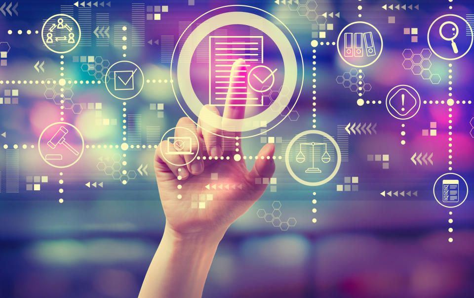 A finger pressing a digital button surrounded by various regulatory compliance icons