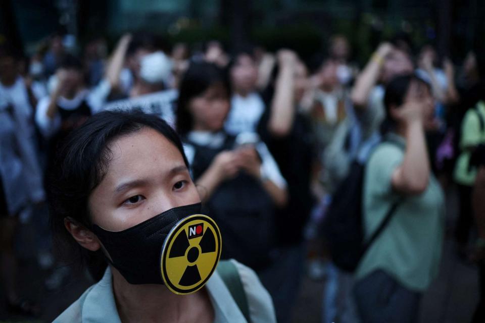 PHOTO: Activists attend a protest against Japan's plan to release treated wastewater from the Fukushima nuclear power plant into the ocean, in Seoul, South Korea, August 22, 2023. (Kim Hong-ji/Reuters)