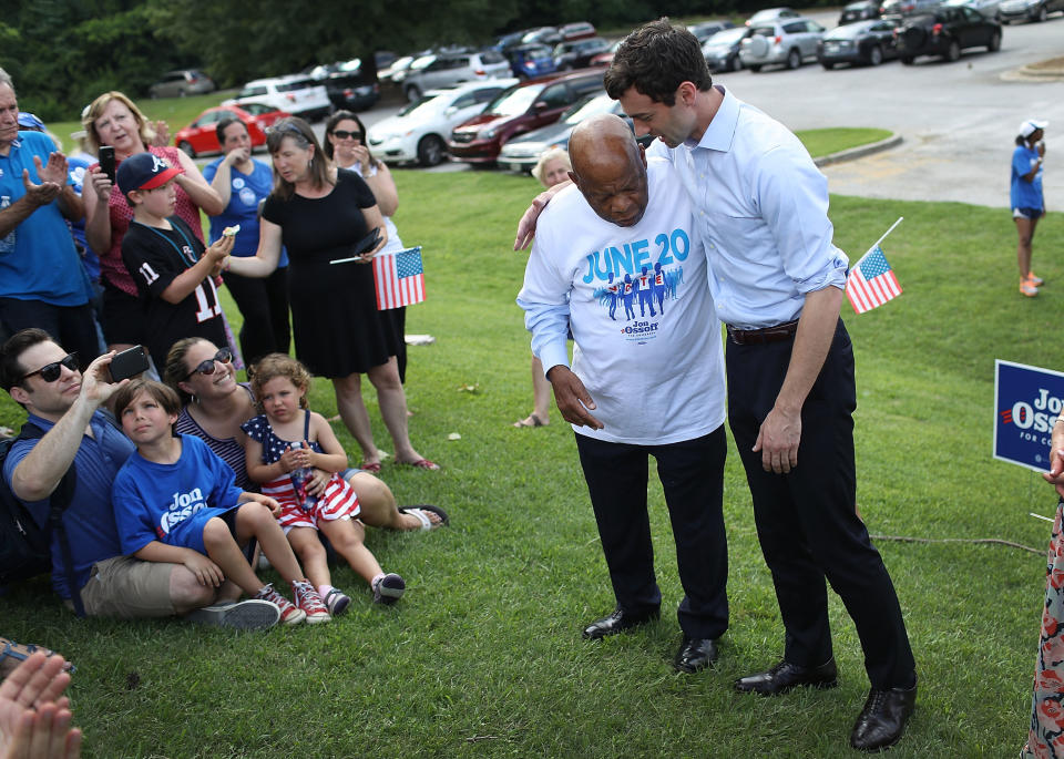 Jon Ossoff joined by the late John Lewis campaigning in 2017. (Getty Images)