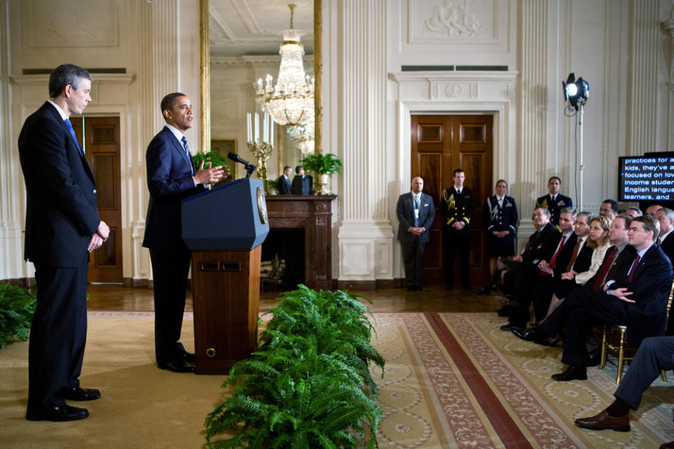 U.S. President Barack Obama, joined by Education Secretary Arne Duncan (L), speaks about the No Child Left Behind law in the East Room of the White House on February 9, 2012 in Washington, DC. Obama announced that ten states that have agreed to implement reforms around standards and accountability will receive flexibility from the mandates of the federal education law. (Photo by Brendan Hoffman/Getty Images)
