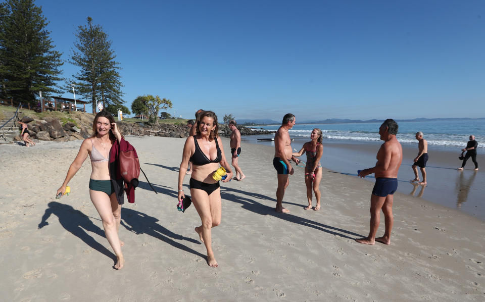 People are seen in Byron Bay, New South Wales, Saturday, September 11, 2021. Source: AAP