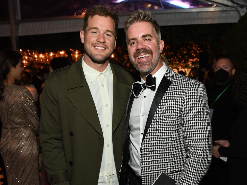 Colton Underwood and Jordan C. Brown pose for a photo.