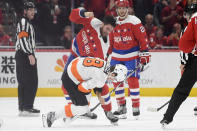 Washington Capitals right wing Tom Wilson (43) fights with Philadelphia Flyers defenseman Robert Hagg (8) during the second period of an NHL hockey game Wednesday, March 4, 2020, in Washington. (AP Photo/Nick Wass)