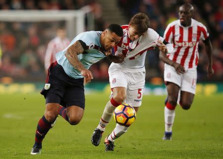 Britain Football Soccer - Stoke City v Burnley - Premier League - bet365 Stadium - 3/12/16 Burnley's Andre Gray in action with Stoke City's Marc Muniesa Reuters / Andrew Yates Livepic