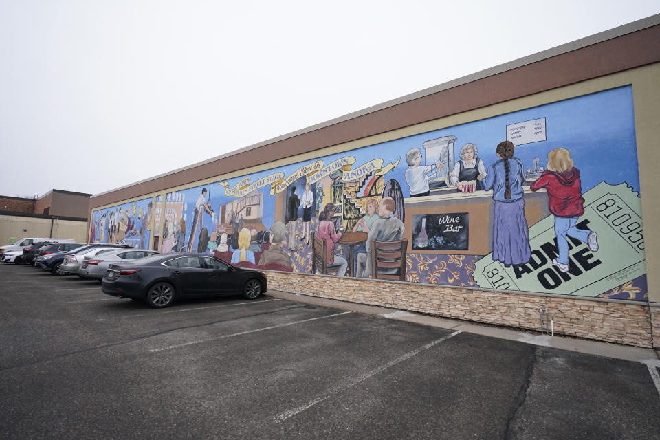 FILE - A mural is pictured Saturday, Feb. 3, 2024, in Anoka, Minn. The U.S. Department of Justice and the city of Anoka, Minn., a Minneapolis suburb, have reached an agreement to resolve allegations from the Department that the city's enforcement of a "crime-free" housing ordinance discriminated against people with mental illnesses by encouraging landlords to evict them if there were too many emergency services calls to their homes or apartments. (AP Photo/Abbie Parr, File)