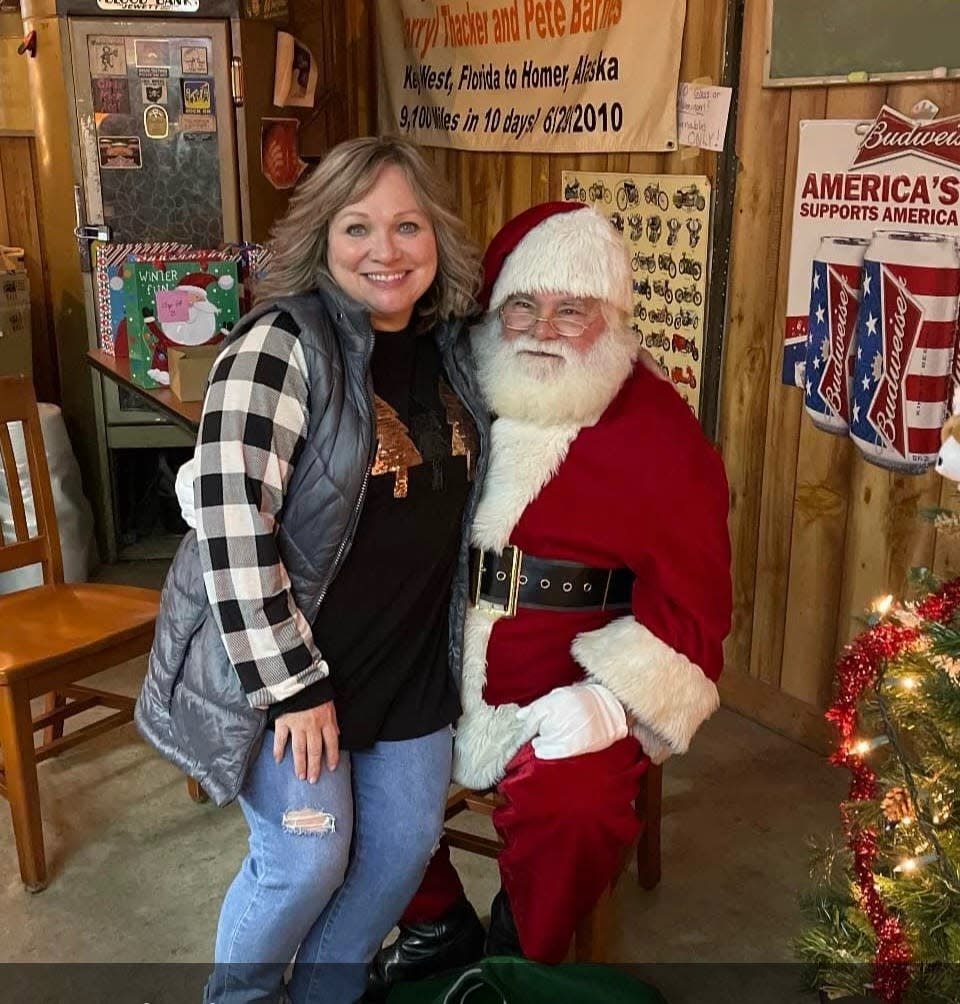 Jodi Rife was one of Santa's helpers at a Marion Area Harley Riders Association party. For 25 years she has led the Junior Service Guild Christmas Clearinghouse to make families’ holidays brighter. The Riders Association is one of the biggest donors to the cause.