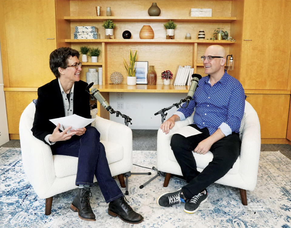 Rachel Maddow left in conversation with longtime producer Isaac-Davy Aronson, who followed Maddow from cable news to podcasting.