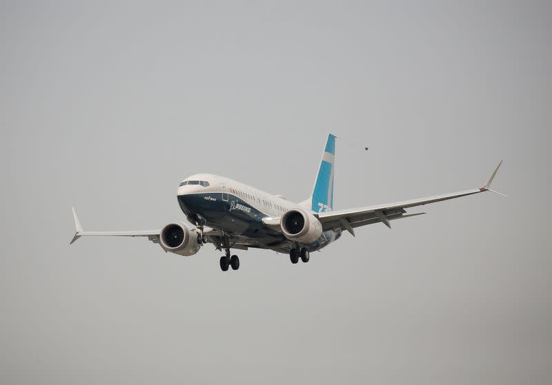 A Boeing 737 MAX aircraft lands during an evaluation flight in Seattle