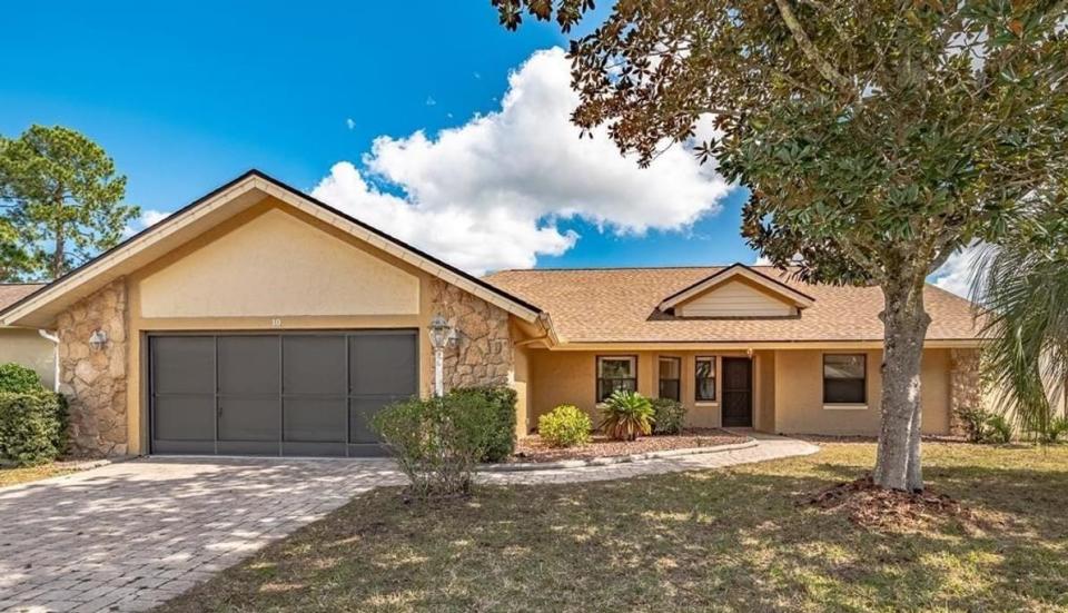 Built in 1989, this Bolling Lane home has three bedrooms and two baths in 2,009 square feet of living space. It also has a screened pool, skylights and an updated kitchen, and it sold recently for $425,000.