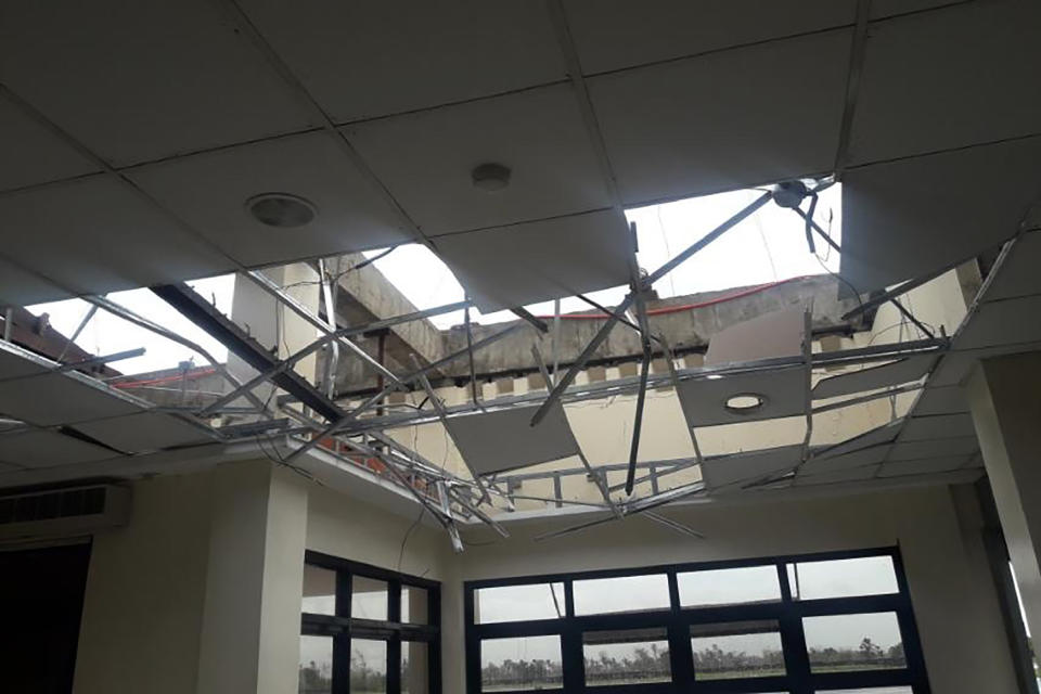 This photo provided by the Civil Aviation Authority of the Philippines shows a damaged roof at the Naga airport in Naga city, central Philippines, as Typhoon Goni hits the country, Sunday Nov. 1, 2020. The super typhoon has slammed into the eastern Philippines with ferocious winds, knocking down power in several towns and prompting the evacuation of about a million people in its projected path. (Civil Aviation Authority of the Philippines via AP)