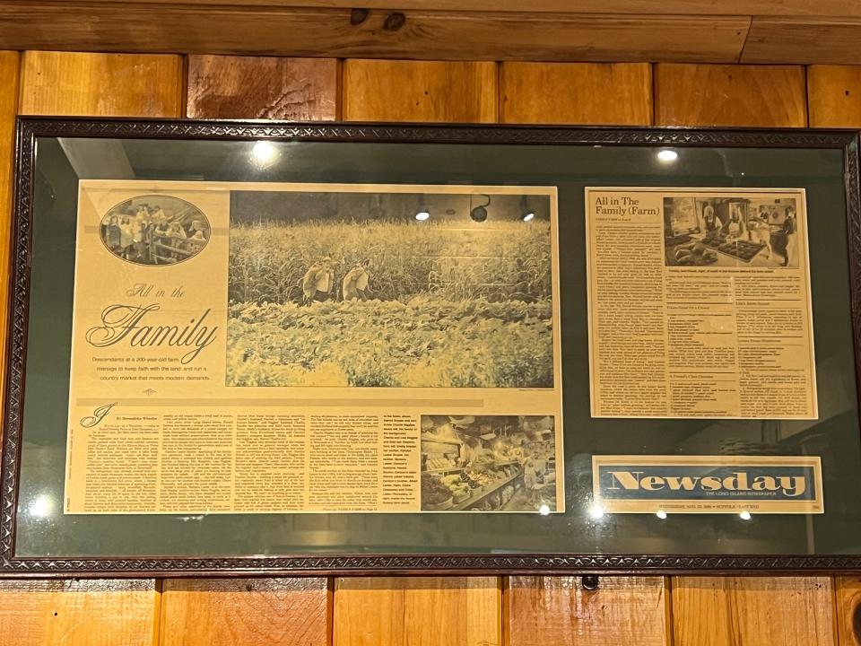 newspaper article inside round swamp farm