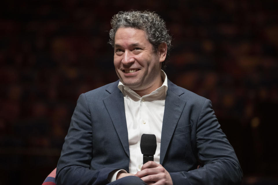 Gustavo Dudamel is introduced as the New York Philharmonic's 27th music and artistic director, Monday, Feb. 20, 2023, in the newly renovated David Geffen Hall at Lincoln Center for the Performing Arts in New York. (AP Photo/John Minchillo)