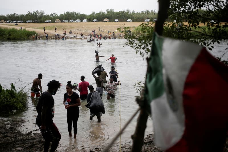 Migrants seeking refuge in the U.S. cross Rio Grande river, in Ciudad Acuna