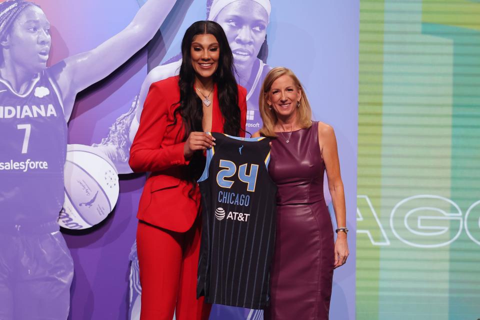 Kamilla Cardoso poses with WNBA commissioner Cathy Engelbert after she is selected with the No. 3 overall pick by the Chicago Sky in the 2024 WNBA draft.