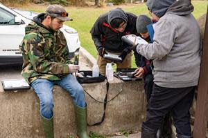 Hunter Edison and other Water First interns recording water quality data in preparation for operator in training exams.