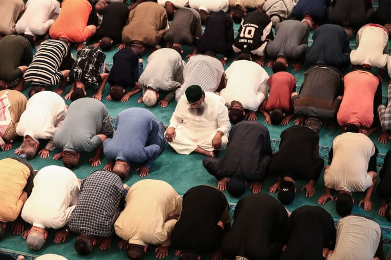 People perform taraweeh prayer on Laylat al-Qadr (Night of Power) during Ramadan in the Mausoleum of Abdul-Qadir Gilani in central Baghdad. Laylat al-Qadr is the night when Muslims believe the Quran was first sent down from heaven to the world and also the night when the first verses of the Quran were revealed to the Islamic prophet Muhammad. Ameer Al-Mohammedawi/dpa