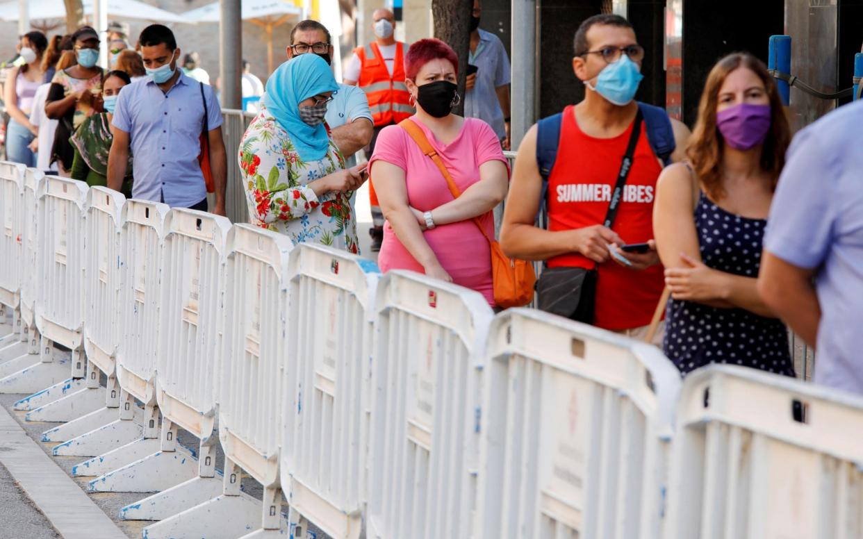 Thousands of people were contacted after mass screening detected hundreds of asymptomatic cases in Barcelona neighbourhoods with high transmission rates - Susanna Saez/EPA-EFE