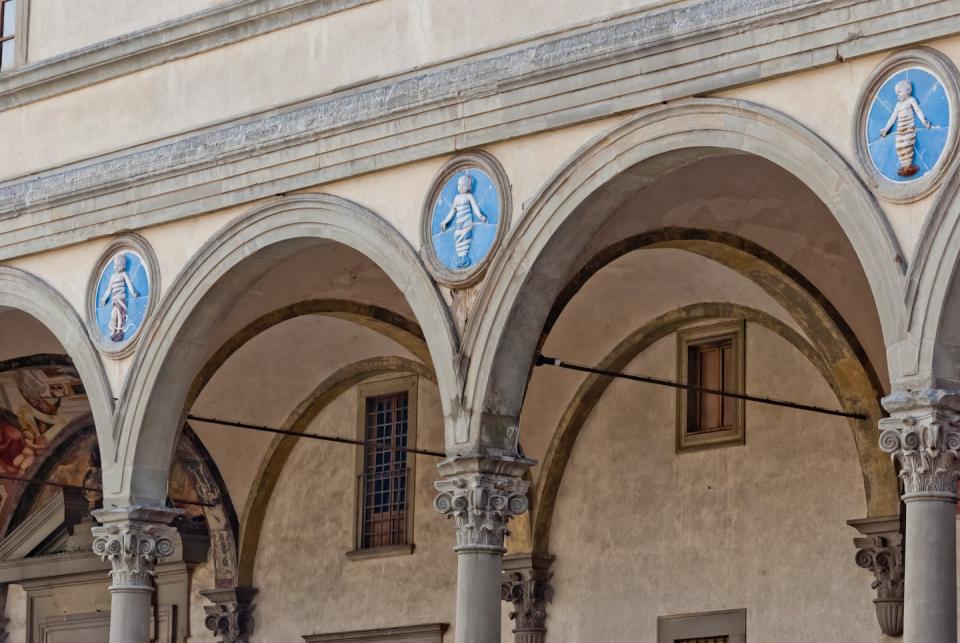 A few of the terracotta roundels in the portico of Brunelleschi’s Hospital of Innocents in Florence, Italy. (Shutterstock)