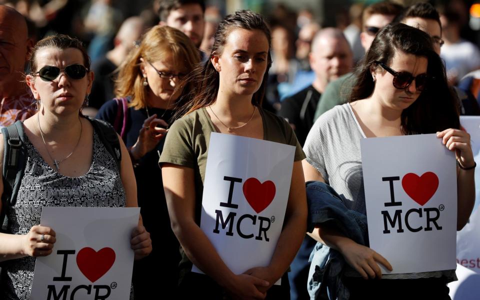 Vigil for victims of the Manchester victims - Credit: DARREN STAPLES/Reuters