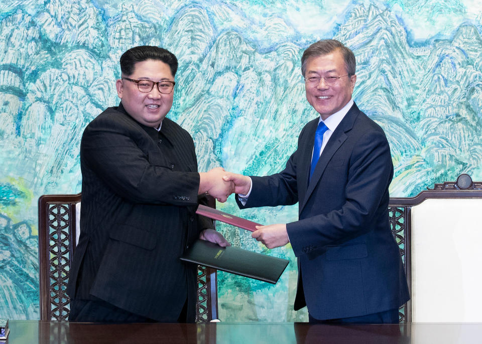 FILE - In this April 27, 2018 file photo, North Korean leader Kim Jong Un, left, and South Korean President Moon Jae-in shake hands after signing on a joint statement at the border village of Panmunjom in the Demilitarized Zone, South Korea. The main focus of outside attention to this week’s inter-Korean summit is whether it can find ways to resolve the stalemated diplomacy on North Korea’s nuclear program. Also at stake is what steps the Koreas will take to lower decades-long military tensions and improve ties. (Korea Summit Press Pool via AP, File)