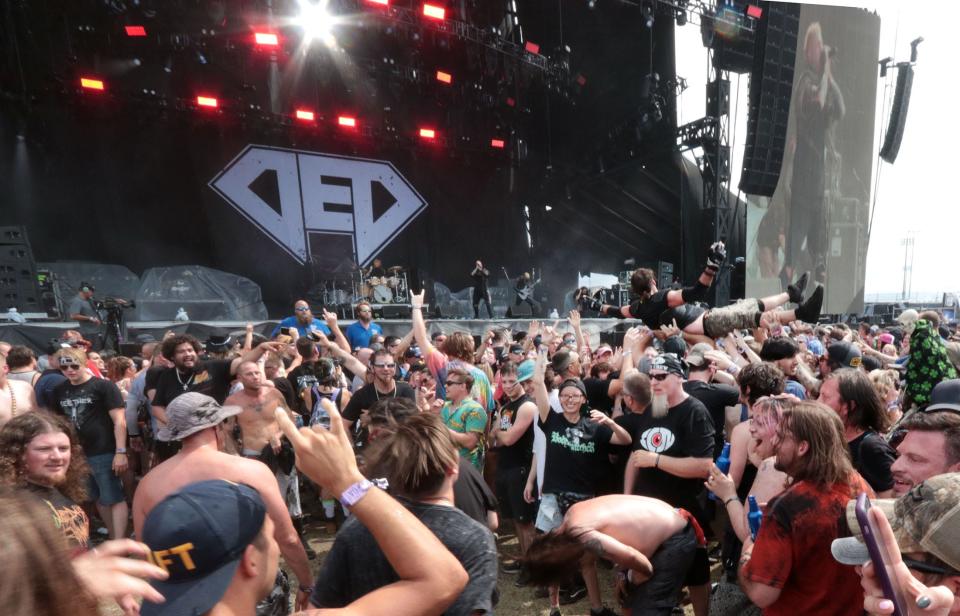 Fans kick up dust in the mosh pit at the 2022 edition of the Welcome to Rockville music festival at Daytona International Speedway. The four-day heavy-metal marathon returns May 9-12 to Daytona Beach.
