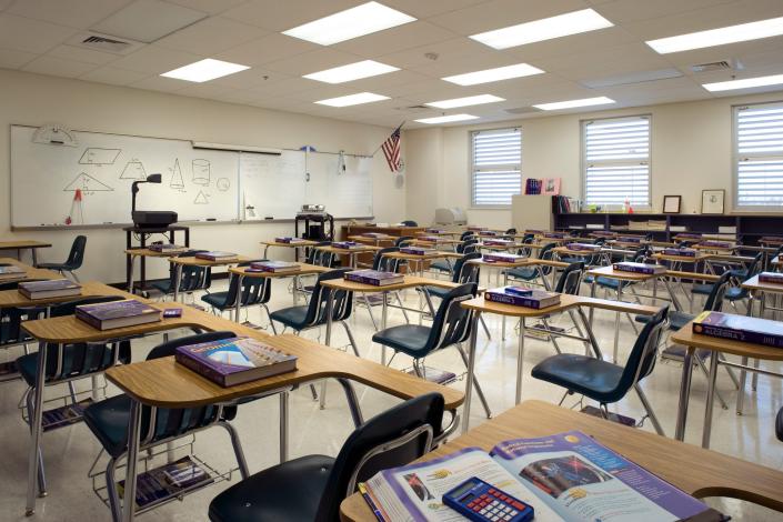 An empty high school classroom.